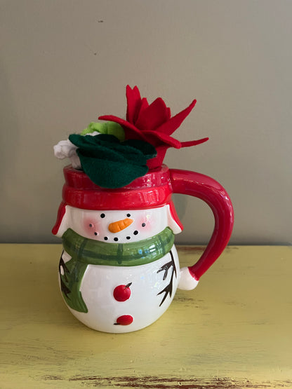 Mug with succulents and flowers