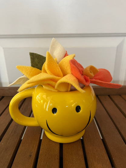 Mug with succulents and flowers