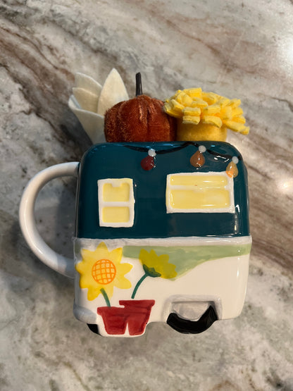 Mug with succulents and flowers