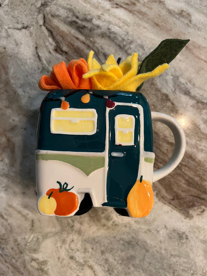 Mug with succulents and flowers